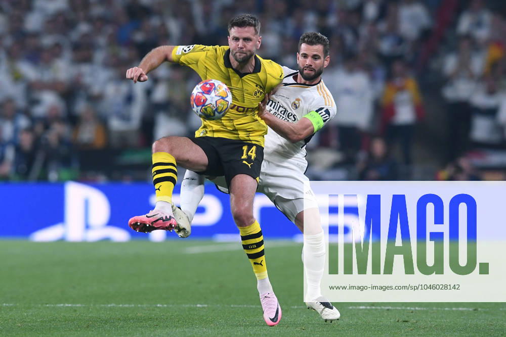 Fußball Champions League Finale Borussia Dortmund - Real Madrid am 01.06.2024 im Wembley-Stadion in London Niclas Füllkrug ( Dortmund ), vorne - Nacho ( Madrid ), hinten