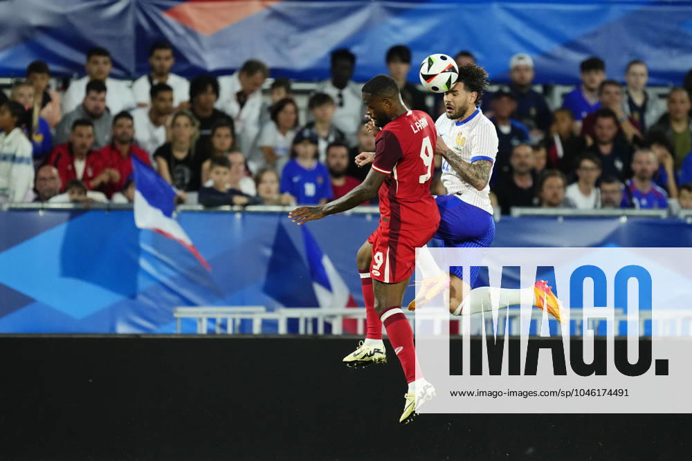 France v Canada - International Friendly, Länderspiel, Nationalmannschaft Cyle Larin centre-forward of Canada and RCD Mallorca and Theo Hernandez eft-back of France and AC Milan compete for the ball during the friendly match between France and Canada at Nouveau Stade Bordeaux on June 9, 2024 in Bordeaux, France. Bordeaux France