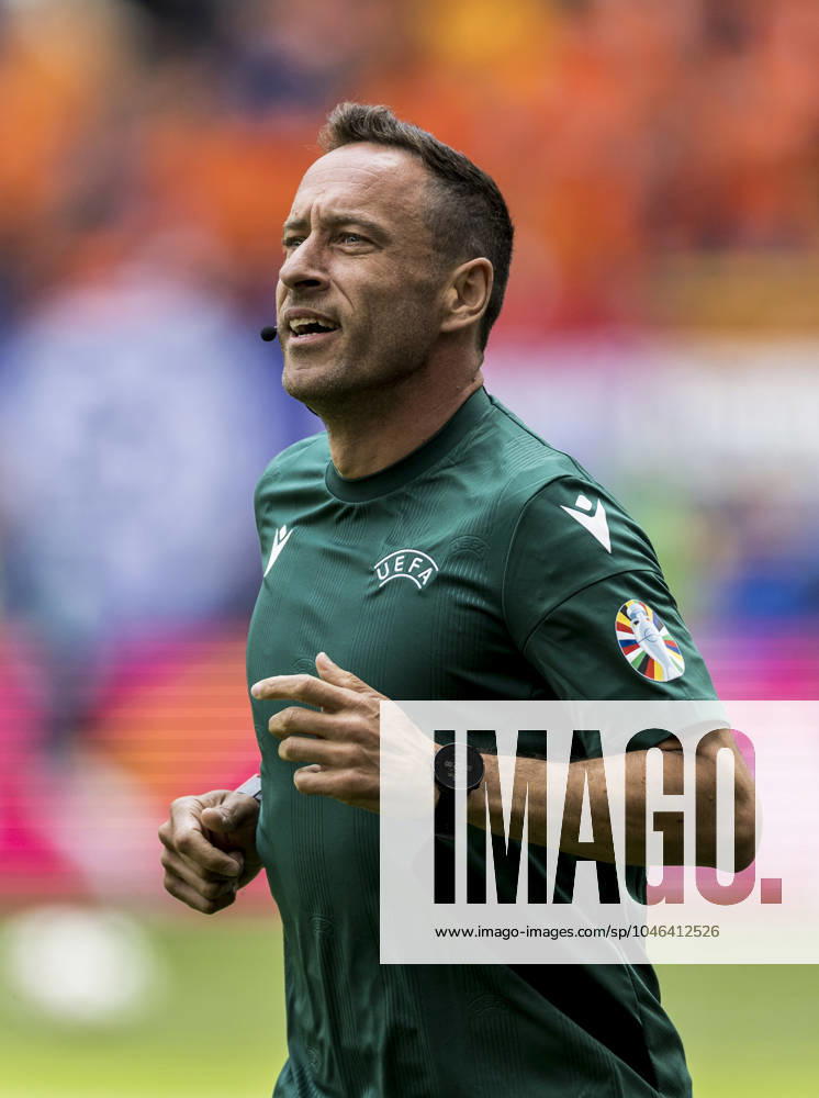 Poland v Netherlands, UEFA EURO, EM, Europameisterschaft,Fussball 2024, Hamburg, Germany Hamburg, Germany. 16th, June 2024. Referee Artur Dias is warming up before the UEFA Euro 2024 match in Group D between Poland and the Netherlands at Volksparkstadion in Hamburg. Hamburg Germany