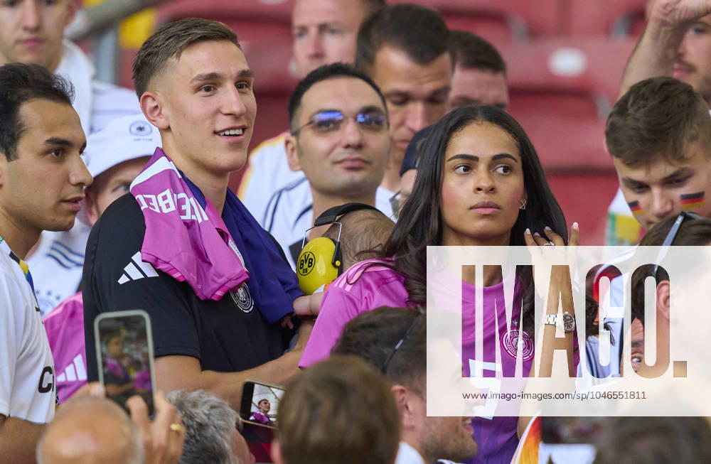 Nico Schlotterbeck, DFB 15 wife Sabrina, and baby, son, daughter in the group stage match GERMANY - HUNGARY 2-0 of the UEFA European Championships 2024 on Jun 19, 2024 in Stuttgart, Germany.