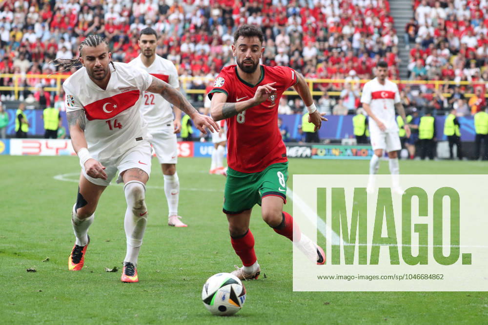 Germany - UEFA EURO, EM, Europameisterschaft,Fussball 2024 - Turkey vs Portugal - 15 06 2024 GERMANY, DORTMUND, JUNE 22. Bruno Fernandes of Portugal duels for the ball with Abdulkerim Bardakci of Turkey during the UEFA EURO 2024 group F stage match between Turkey and Portugal, on June 22, 2024 at BVB Stadion in Dortmund, Germany. Photo by Manuel Blondeau AOP.Press Dortmund BVB Stadion Germany