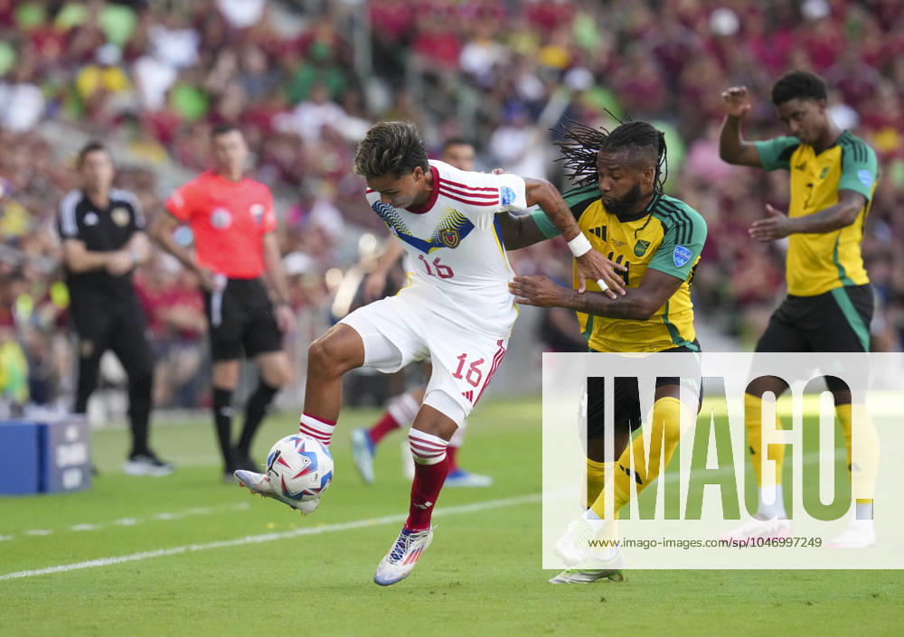 TELASCO JOSE SEGOVIA of Venezuela (16) is blocked from a shot to the goal by KASEY REMEL PALMER (14) of Jamaica early in first half action in the Group B final stage match of the CONCACAF Copa America 2024 at Austin s Q2 Stadium on June 30, 2024. Venezuela eliminated Jamaica, 3-0 to advance to the quarter finals. Austin United States - ZUMAd150 20240630_znp_d150_024