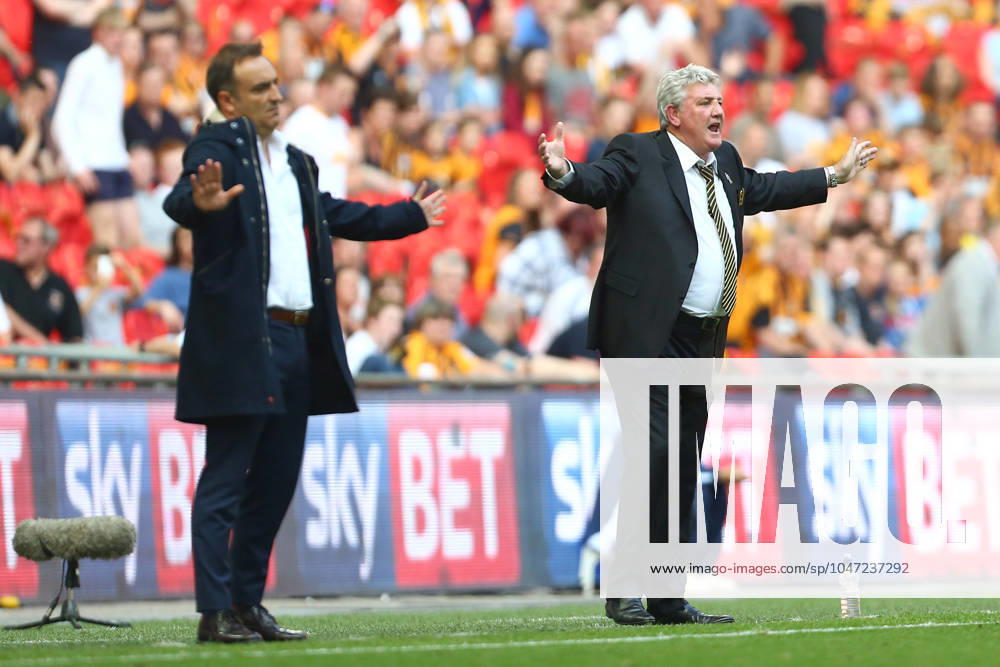 Soccer 2016: European Soccer May 28, 2016 - London, United Kingdom - Sheffield Wednesday?s manager, Carlos Carvalhal and Hull?s manager, Steve Bruce react during the Skybet Championship Play Off Final match at Wembley Stadium. Photo credit should read: Philip Oldham Sportimage. London United Kingdom