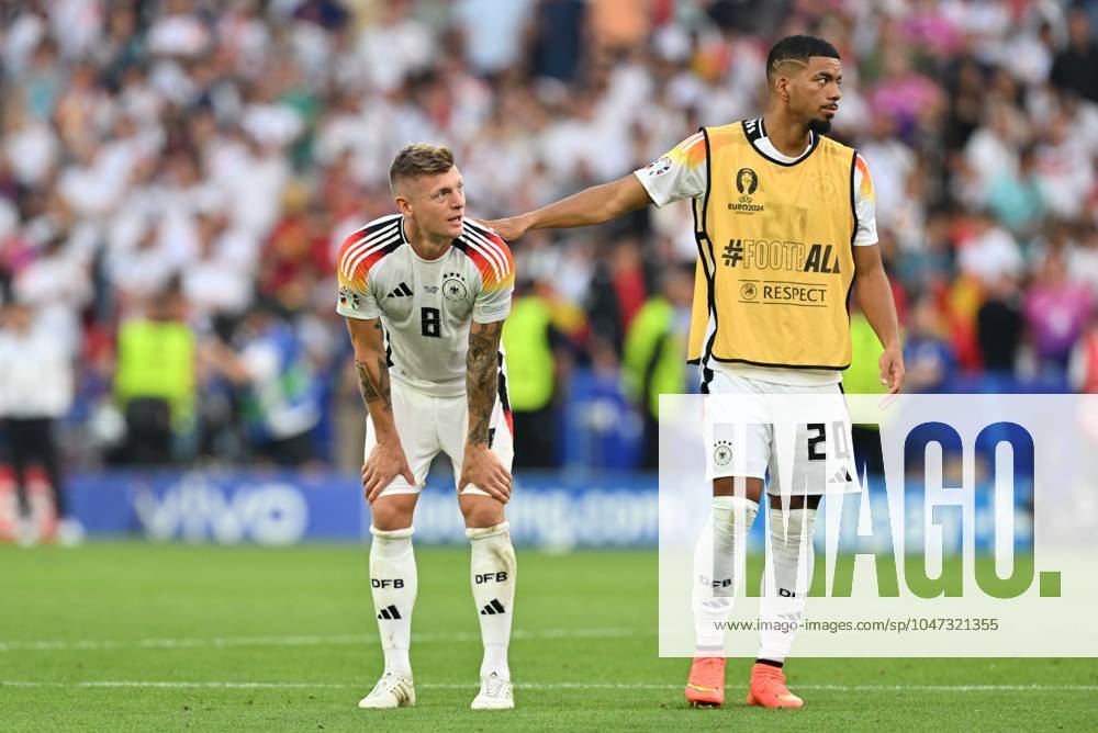 EURO2024 SPAIN VS GERMANY Toni Kroos (8) of Germany and Benjamin Henrichs (20) of Germany looking dejected and disappointed after losing a soccer game between the national teams of Spain and Germany in the Quarter Final stage of the UEFA EURO, EM, Europameisterschaft,Fussball 2024 tournament , on Thursday 5 July 2024 in Stuttgart , Germany . PHOTO SPORTPIX David Catry STUTTGART GERMANY