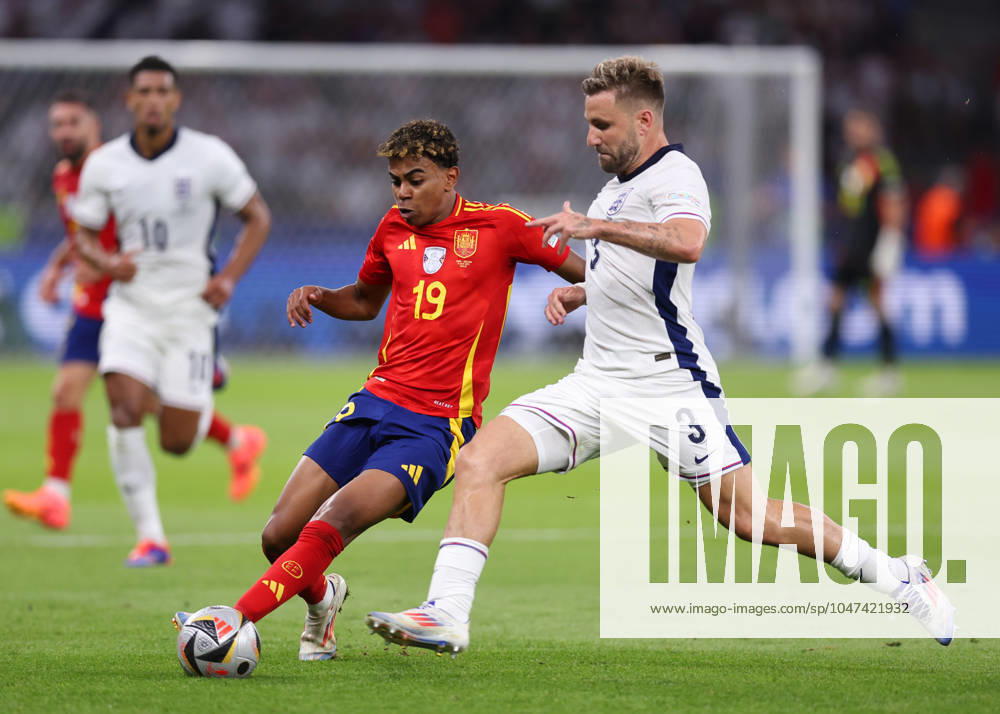 Berlin, Germany, 14th July 2024. Lamine Yamal of Spain tackled by Luke Shaw of England during the UEFA European Championships final match at Olympiastadion, Berlin. Picture credit should read: David Klein Sportimage . SPI-3228-0079