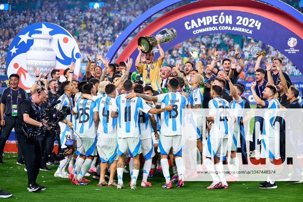 Copa America USA 2024 Argentina vs Colombia - Final Oscar Ruggeri lifts up the trophy as he celebrates winning the Conmebol 2024 Copa America during Final match between Argentina and Colombia as part of CONMEBOL Copa America USA 2024 at Hard Rock Stadium on July 14, 2024 in Miami Gardens, Florida, United States. MIAMI GARDENS FLORIDA UNITED STATES