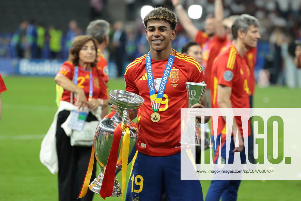 Berlin, Germany, 14th July 2024. Lamine Yamal of Spain poses with the Henri Delaunay Cup and his Young Player of the Tournament Award following the 2-1 victory in the UEFA European Championships final match at Olympiastadion, Berlin. Picture: Jonathan Moscrop Sportimage . SPI-3226-0186