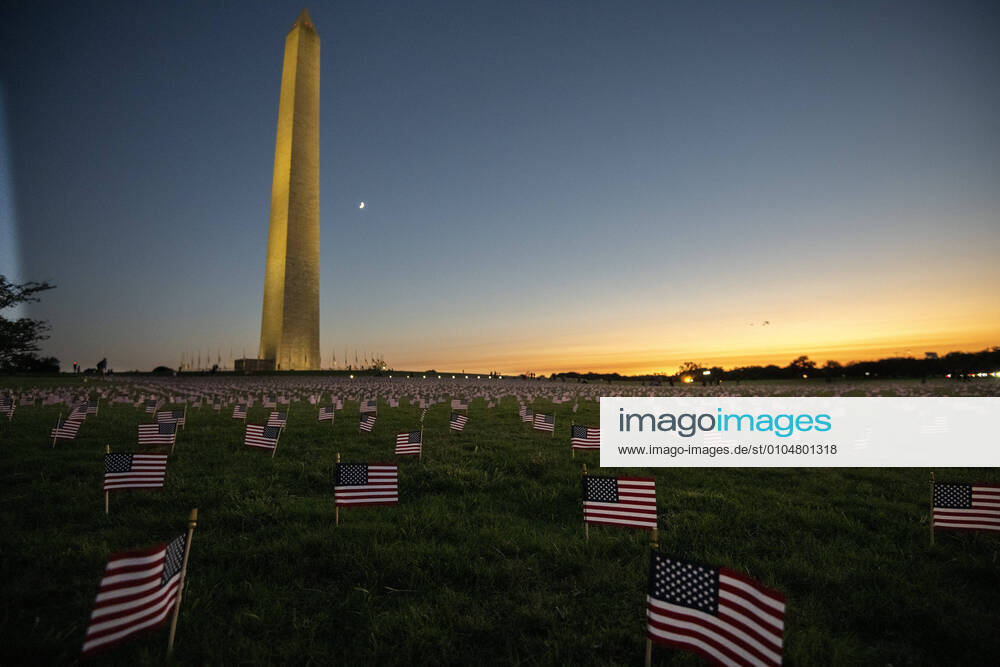Some 20,000 American flags are placed by the Covid Memorial Project on the National Mall to represent the 200,000 Americans who have died in 2020 due to the Covid-19 pandemic, in Washington, DC on Monday, September 21, 2020. There will be a commemoration for the 200,000 on Tuesday. More than seven million Americans have had the coronavirus. WAP2020091930 PATxBENIC