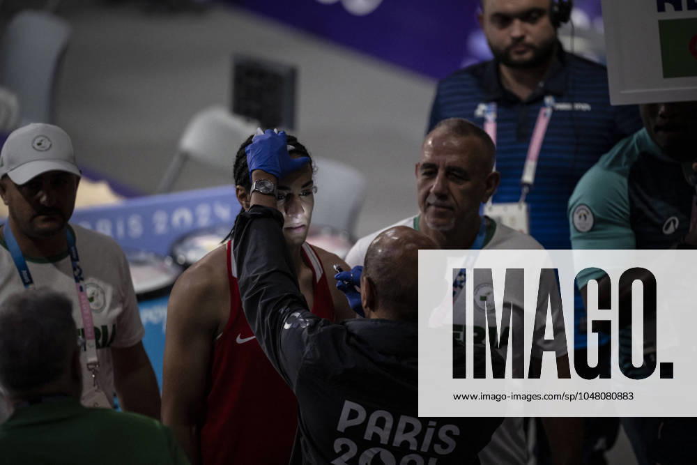 Paris 2024 - Controversal Biologically Male Boxer Imane Khelif in Women Category Algeria s Imane Khelif (in red) during their women s 66kg preliminaries round of 16 boxing match during the Paris 2024 Olympic Games, Olympische Spiele, Olympia, OS at the North Paris Arena, in Villepinte on August 1, 2024. Female boxer yells this is unjust and falls to her knees in tears as she quits fight against biologically male Olympic opponent Imane Khelif after just 46 seconds following two powerful punches. Photo by Eliot Blondet ABACAPRESS.COM Paris France