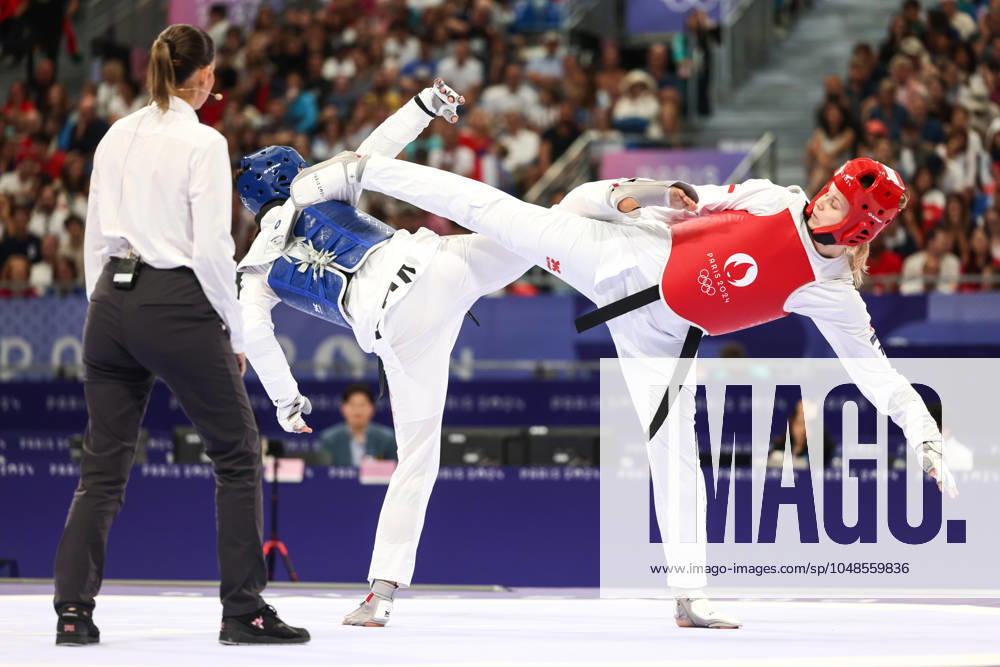 OLYMPICS - Olympic Summer Games 2024 PARIS,FRANCE,10.AUG.24 - OLYMPICS, TAEKWONDO - Olympic Summer Games Paris 2024, +67kg, women. Image shows Zeqi Zhou (CHN) and Marlene Jahl (AUT). GEPAxpictures Rauthner