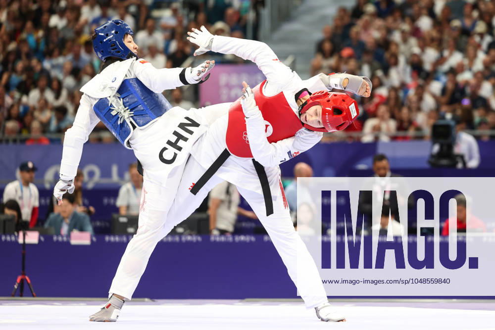 OLYMPICS - Olympic Summer Games 2024 PARIS,FRANCE,10.AUG.24 - OLYMPICS, TAEKWONDO - Olympic Summer Games Paris 2024, +67kg, women. Image shows Zeqi Zhou (CHN) and Marlene Jahl (AUT). GEPAxpictures Rauthner