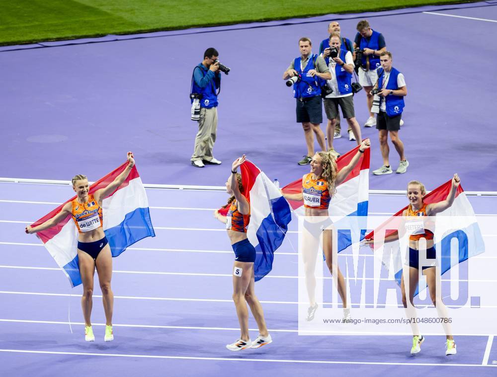 PARIS - Lieke Klaver, Cathelijn Peeters, Lisanne de Witte and Femke Bol react after winning the silver medal in the 4 x 400m relay (w) of athletics during the Olympic Games, Olympische Spiele, Olympia, OS ANP ROBIN VAN LONKHUIJSEN ANPxSportx IVx 505721772 originalFilename: 505721772