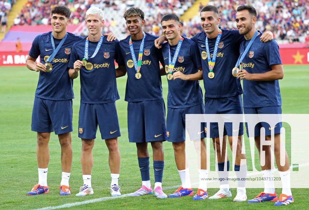 FC Barcelona, Barca v AS Monaco - Trofeu Joan Gamper Pau Cubarsi, Dani Olmo, Lamine Yamal, Pedri, Ferran Torres, and Eric Garcia are holding the Olympic gold medal won in Paris, before the match between FC Barcelona and AS Monaco, corresponding to the 59th edition of the Joan Gamper Trophy, at the Lluis Companys Stadium, in Barcelona, Spain, on August 12, 2024. Barcelona Barcelona Spain