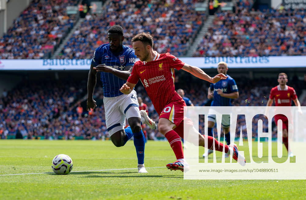 Diogo Jota of Liverpool tries to get past Axel Tuanzebe of Ipswich Town during the Premier League match between Ipswich Town and Liverpool at Portman Road, Ipswich, England on 17 August 2024.