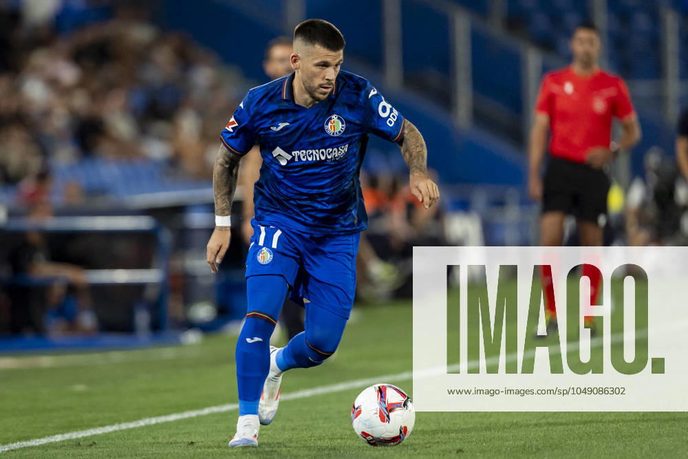 Getafe CF vs Rayo Vallecano - La Liga EA Sports 2024 25 Carles Perez of Getafe CF in action with the ball during the La Liga EA Sports 2024 25 football match between Getafe CF vs Rayo Vallecano at Estadio Coliseum on August 24, 2024 in Getafe, Spain. Getafe Estadio Coliseum Madrid Spain