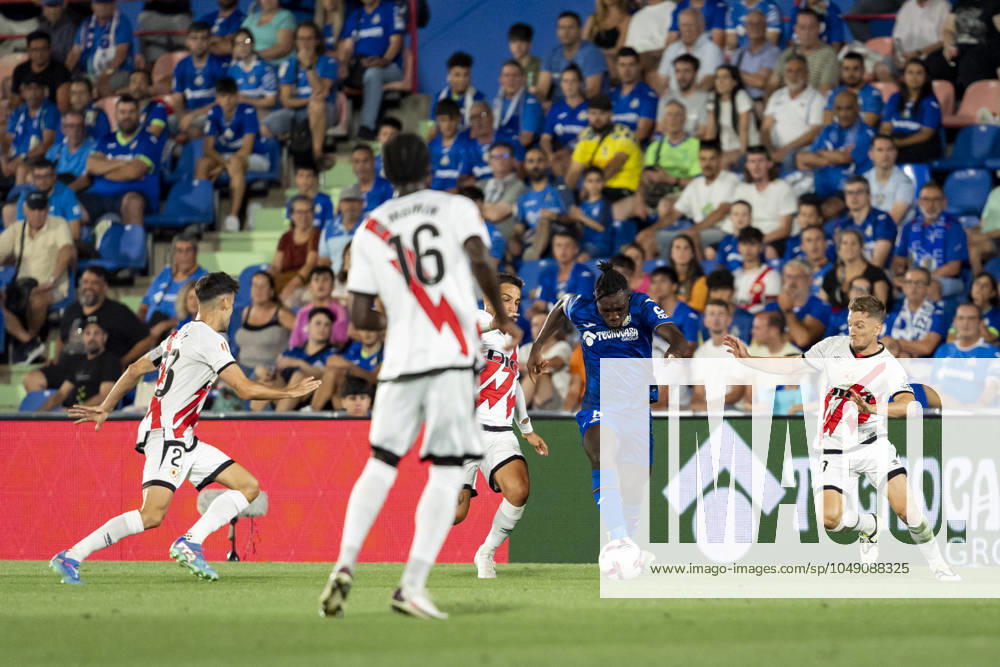 Getafe CF vs Rayo Vallecano - La Liga EA Sports 2024 25 Christantus Ugonna Uche of Getafe CF seen running with the ball in the middle of Rayo Vallecano defenders during the La Liga EA Sports 2024 25 football match between Getafe CF vs Rayo Vallecano at Estadio Coliseum on August 24, 2024 in Getafe, Spain. Getafe Estadio Coliseum Madrid Spain