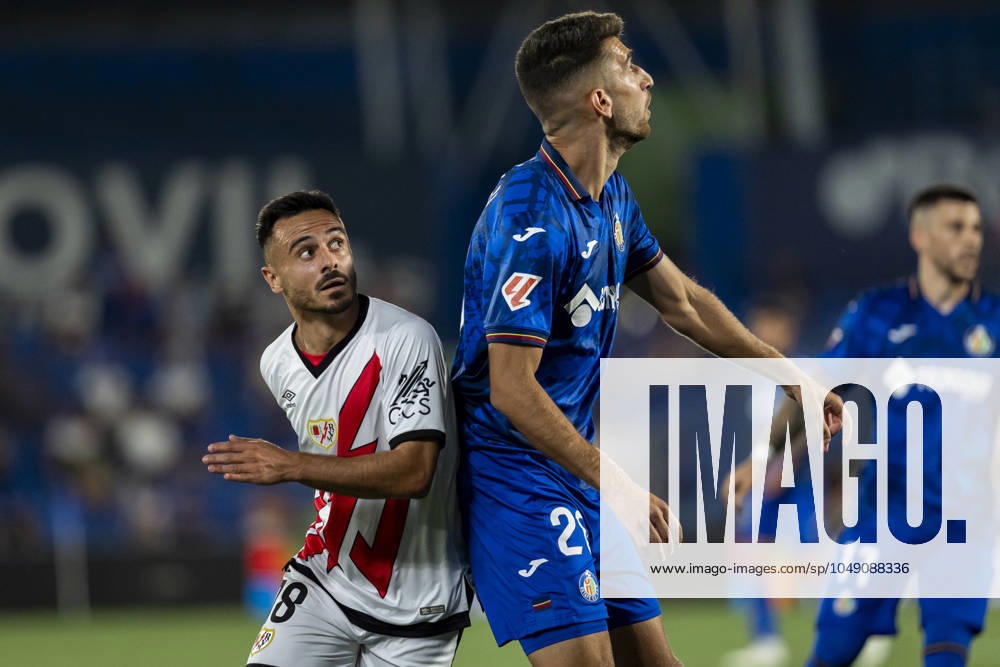 Getafe CF vs Rayo Vallecano - La Liga EA Sports 2024 25 Alvaro Garcia (L) of Rayo Vallecano in action against Yellu Santiago (R) of Getafe CF during the La Liga EA Sports 2024 25 football match between Getafe CF vs Rayo Vallecano at Estadio Coliseum on August 24, 2024 in Getafe, Spain. Getafe Estadio Coliseum Madrid Spain