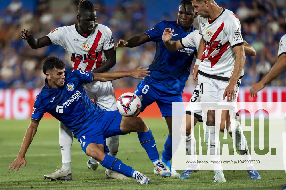 Getafe CF vs Rayo Vallecano - La Liga EA Sports 2024 25 Juan Iglesias (L) of Getafe CF seen falling down during the La Liga EA Sports 2024 25 football match between Getafe CF vs Rayo Vallecano at Estadio Coliseum on August 24, 2024 in Getafe, Spain. Getafe Estadio Coliseum Madrid Spain