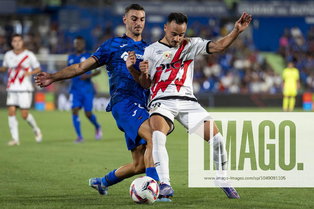 Getafe CF vs Rayo Vallecano - La Liga EA Sports 2024 25 Juan Iglesias (L) of Getafe CF in action against Alvaro Garcia (R) of Rayo Vallecano during the La Liga EA Sports 2024 25 football match between Getafe CF vs Rayo Vallecano at Estadio Coliseum on August 24, 2024 in Getafe, Spain. Getafe Estadio Coliseum Madrid Spain
