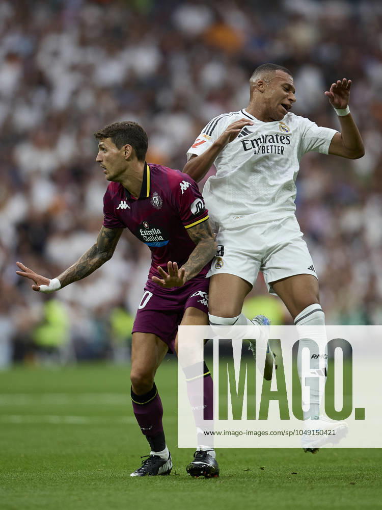 Kylian Mbappe of Real Madrid CF and Luis Perez of Real Valladolid during La Liga football match between Real Madrid CF v Real Valladolid at Santiago Bernabeu Stadium in Madrid, Spain, August 25, 2024 Madrid Spain - ZUMAa206 20240825_zsp_a206_012