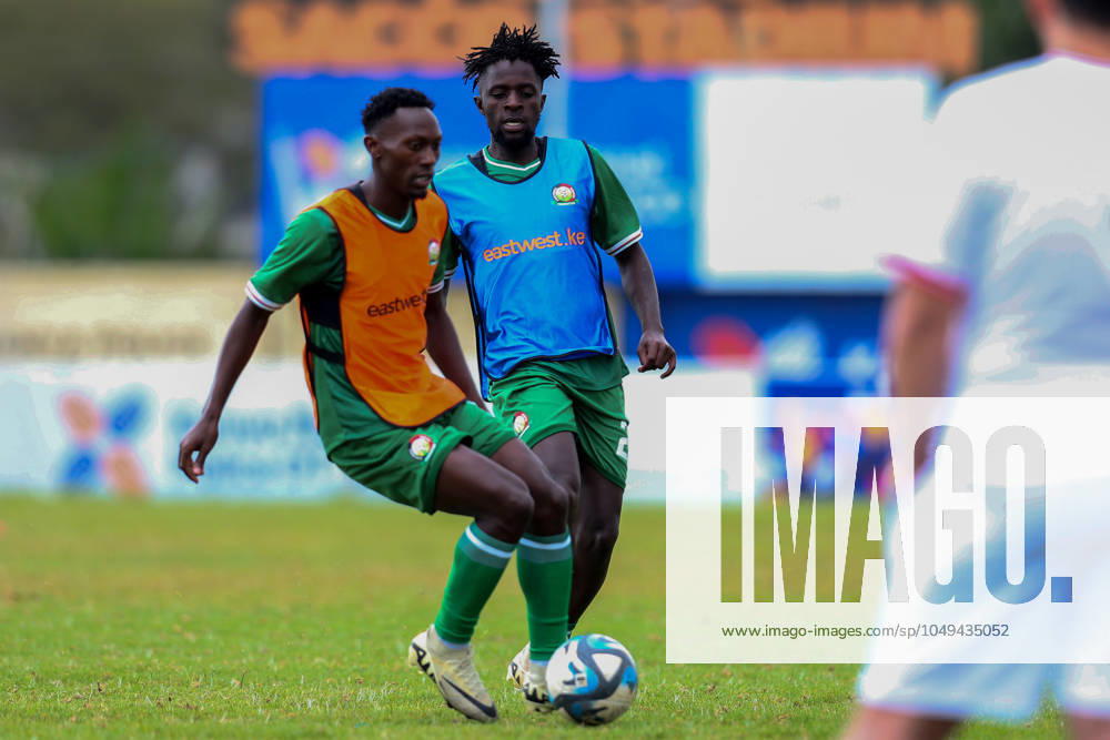 Kenya Men˜s senior national team, Nationalteam midfielder Duke Abuya (left) shields teammate Austin Odhiambo in preparations for 2025 AfCON Qualifiers match against Zimbabwe at Stade Mandela National Stadium on September 1, 2024 in Uganda, Photo by Chris Omollo