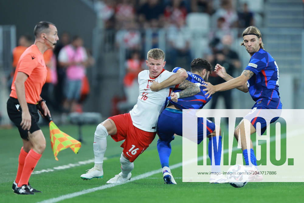 Croatia v Poland - UEFA Nations League 2024 25 League A Group A1 OSIJEK, CROATIA - SEPTEMBER 8: Player of Poland Mateusz Bogusz (L) and players of Croatia Josko Gvardiol (C) and Borna Sosa (R) fight over the ball during the UEFA Nations League 2024 25 League A Group A1 match between Croatia and Poland at on September 8, 2024 in Osijek, Croatia. DavorxJavorovicj Pixsell