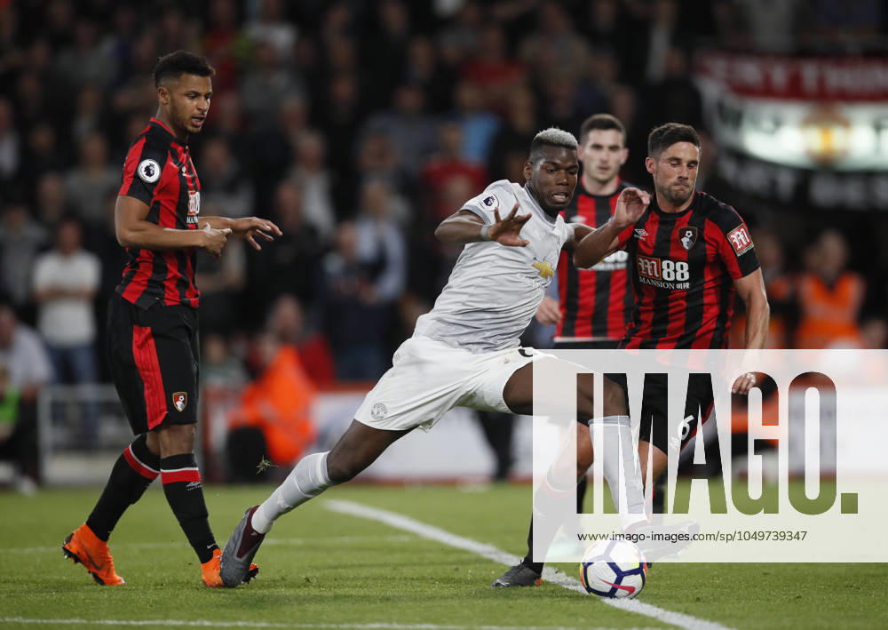 AFC Bournemouth v Manchester United, ManU - Premier League - Vitality Stadium April 18, 2018 - Bournemouth, United Kingdom - Paul Pogba of Manchester United goes down under a tackle by Andrew Surman of Bournemouth during the premier league match at the Vitality Stadium, Bournemouth. Picture date 18th April 2018. Picture credit should read: David Klein Sportimage Bournemouth United Kingdom
