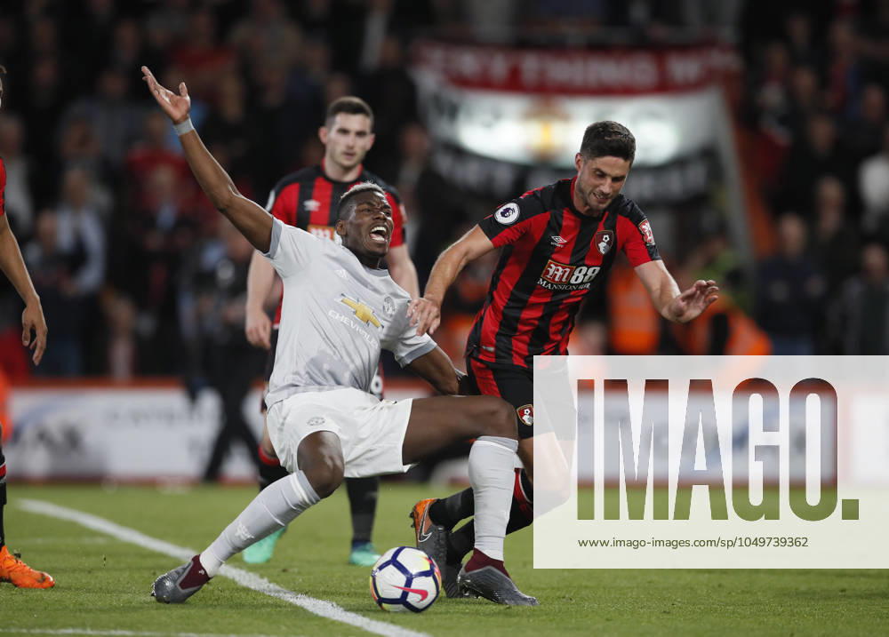 AFC Bournemouth v Manchester United, ManU - Premier League - Vitality Stadium April 18, 2018 - Bournemouth, United Kingdom - Paul Pogba of Manchester United goes down under a tackle by Andrew Surman of Bournemouth during the premier league match at the Vitality Stadium, Bournemouth. Picture date 18th April 2018. Picture credit should read: David Klein Sportimage Bournemouth United Kingdom