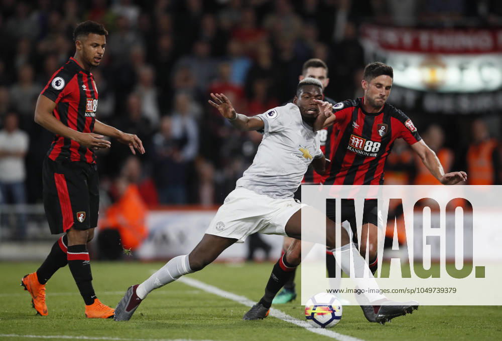 AFC Bournemouth v Manchester United, ManU - Premier League - Vitality Stadium April 18, 2018 - Bournemouth, United Kingdom - Paul Pogba of Manchester United goes down under a tackle by Andrew Surman of Bournemouth during the premier league match at the Vitality Stadium, Bournemouth. Picture date 18th April 2018. Picture credit should read: David Klein Sportimage Bournemouth United Kingdom