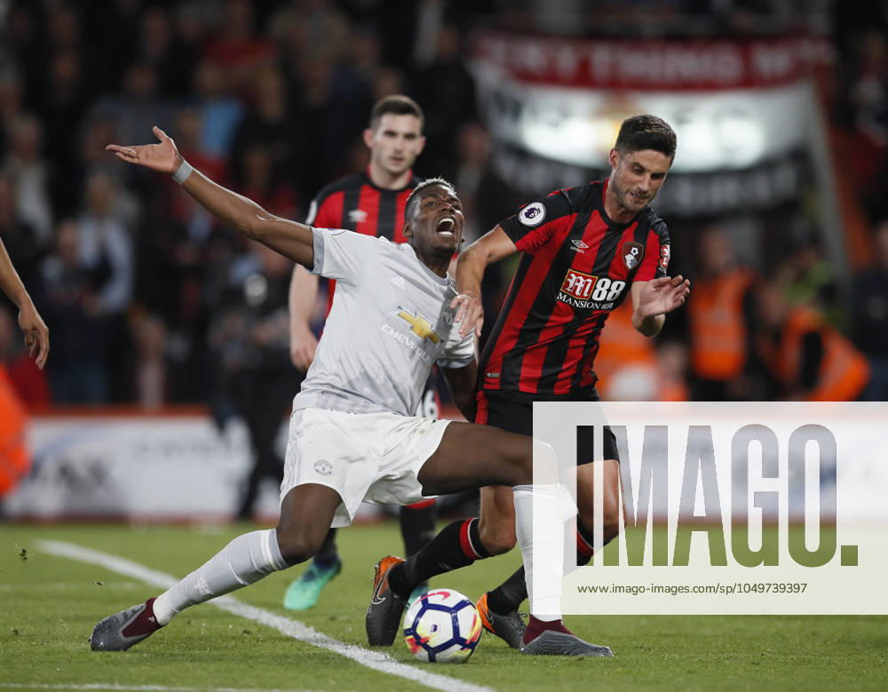 AFC Bournemouth v Manchester United, ManU - Premier League - Vitality Stadium April 18, 2018 - Bournemouth, United Kingdom - Paul Pogba of Manchester United goes down under a tackle by Andrew Surman of Bournemouth during the premier league match at the Vitality Stadium, Bournemouth. Picture date 18th April 2018. Picture credit should read: David Klein Sportimage Bournemouth United Kingdom