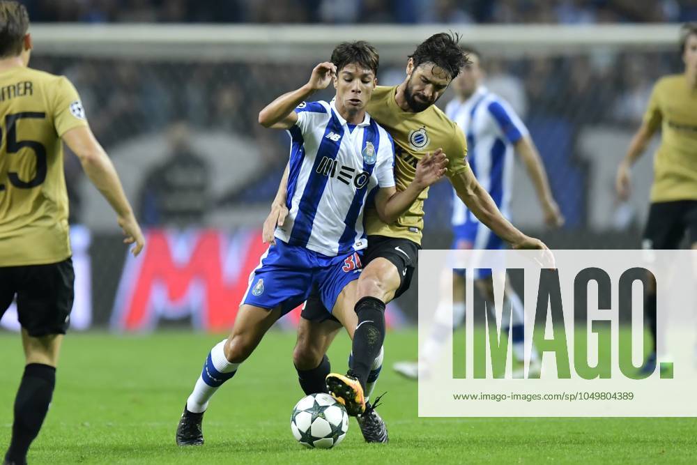 FC Porto v Club Brugge - UEFA Champions League PORTO, PORTUGAL - NOVEMBER 2 : Benoit Poulain defender of Club Brugge tackles Oliver Torres of FC Porto during the Champions League Group H stage match of FC Porto against Club Brugge at the Estadio do Dragao on November 02, 2016 in Porto, Portugal, 2 11 2016 Porto Portugal