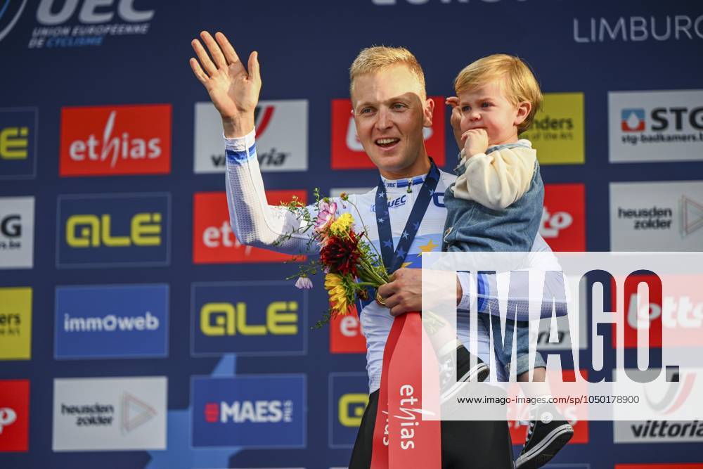 UEC Road European Championships Limburg 15-09-24 Hasselt, Belgium - September 15 : Tim MERLIER (BEL) celebrating his victory on the podium with his child during the Men Elite Road Race of the 2024 UEC Road European Championships Limburg Flanders on September 15, 2024 in Hasselt, Belgium, 15-09-24 ( Motordriver Kenny Verfaillie - Hasselt Belgium