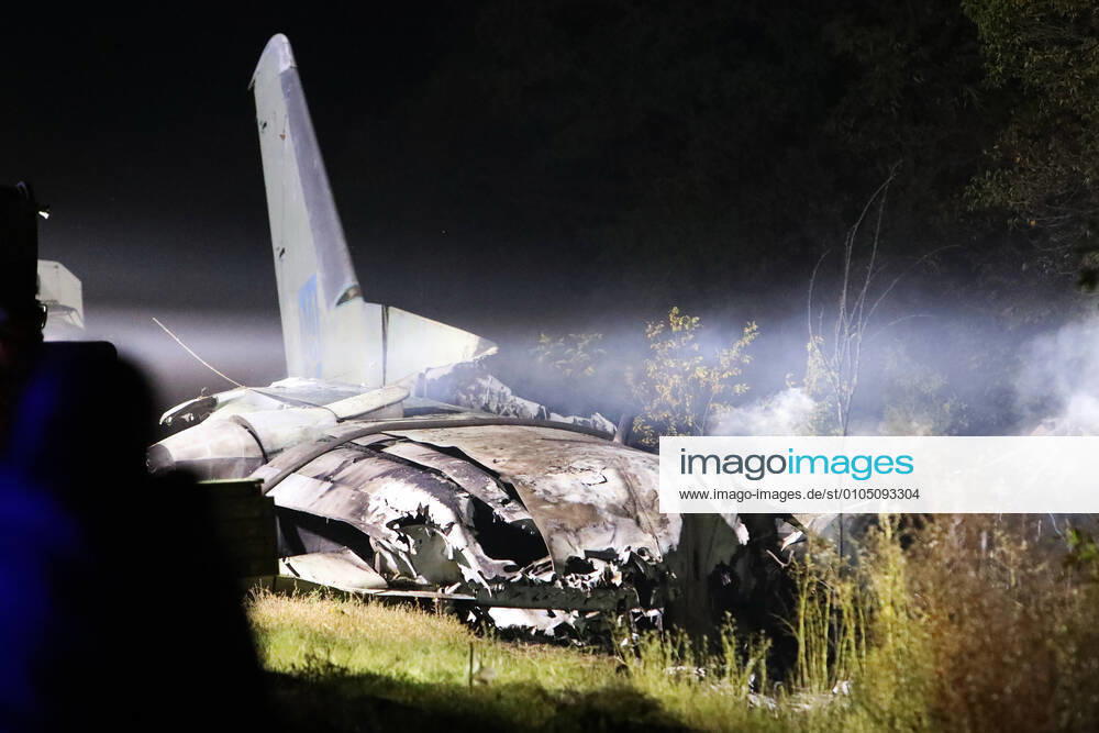 KW39 KHARKIV REGION, UKRAINE - SEPTEMBER 25, 2020 - The response effort to the crash of the Antonov AN-26 military transport aircraft of the Ukrainian Air Force is underway near Chuhuiv, Kharkiv Region, northeastern Ukraine. The plane with 20 cadets of the Ivan Kozhedub National Air Force University and seven crew members on board came down at approximately 20:45 local time on Friday, September 25, during a training flight. As reported, 25 people died on the spot, one person died from burns incompatible with life in hospital, while the sole survivor is receiving treatment. Antonov AN-26 plane crash in Kharkiv Region