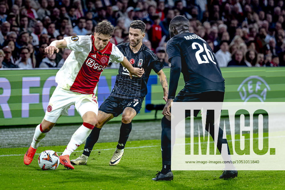 AFC Ajax Amsterdam forwarder Mika Godts, Besiktas JK forwarder Rafa Silva, during the match Ajax - Besiktas at the Johan Cruijff ArenA for the UEFA Europa League - League phase - Matchday 1 season 2024-2025 in AMSTERDAM, Netherlands on 26 september 2024, (photo by Marcel van Dorst EYE4images DeFodi Images) Defodi-746_190857