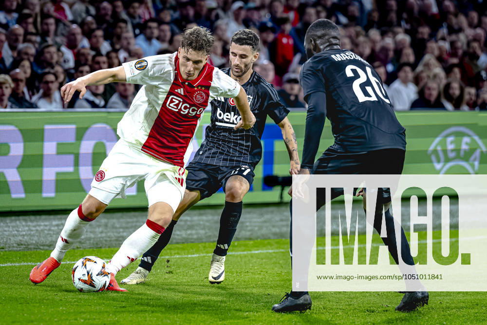 AFC Ajax Amsterdam forwarder Mika Godts, Besiktas JK forwarder Rafa Silva, during the match Ajax - Besiktas at the Johan Cruijff ArenA for the UEFA Europa League - League phase - Matchday 1 season 2024-2025 in AMSTERDAM, Netherlands on 26 september 2024, (photo by Marcel van Dorst EYE4images DeFodi Images) Defodi-746_190858