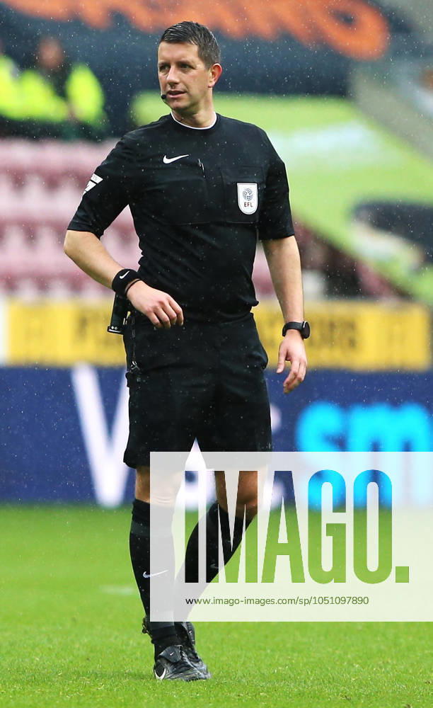 Wigan Athletic v Exeter City EFL Sky Bet League 1 28 09 2024. Referee Scott Simpson during the EFL Sky Bet League 1 match between Wigan Athletic and Exeter City at the Brick Community Stadium, Wigan, England on 28 September 2024. Wigan Brick Community Stadium Greater Manchester England Editorial use only DataCo restrictions apply See www.football-dataco.com ,