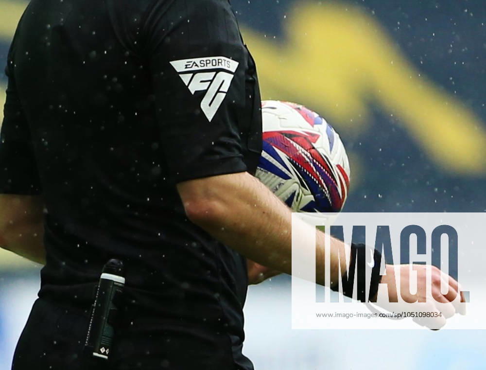 Wigan Athletic v Exeter City EFL Sky Bet League 1 28 09 2024. The EA Sports FC logo on referee Scott Simpson during the EFL Sky Bet League 1 match between Wigan Athletic and Exeter City at the Brick Community Stadium, Wigan, England on 28 September 2024. Wigan Brick Community Stadium Greater Manchester England Editorial use only DataCo restrictions apply See www.football-dataco.com ,