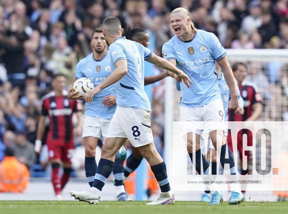Manchester, England, 5th October 2024. Erling Haaland of Manchester City (R) celebrates the goal scored by Mateo KovaÄić of Manchester City (L) during the Premier League match at the Etihad Stadium, Manchester. Picture credit should read: Andrew Yates Sportimage . SPI-3360-0007