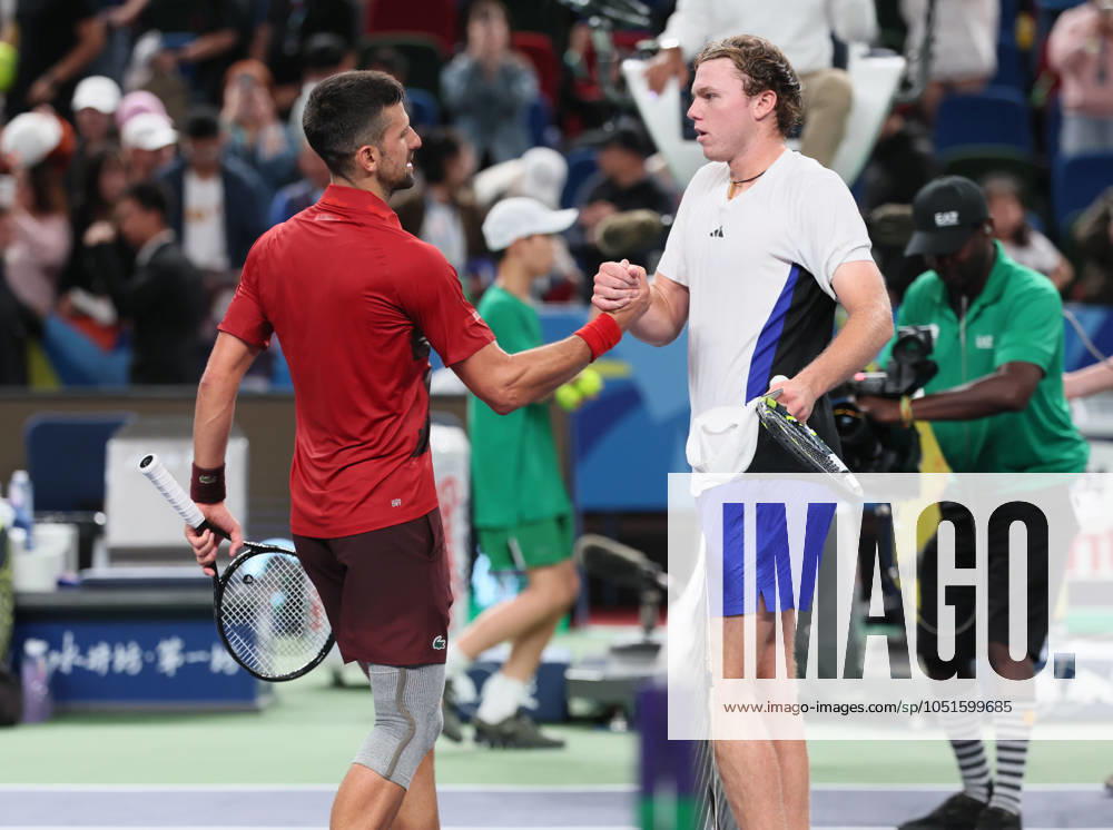 (241005) -- SHANGHAI, Oct. 5, 2024 -- Alex Michelsen (R) of the United States and Novak Djokovic of Serbia shake hands after the men s singles round of 64 match at the ATP, Tennis Herren World Tour Shanghai Masters tennis tournament in Shanghai, east China, Oct. 5, 2024. ) (SP)CHINA-SHANGHAI-TENNIS-ATP TOUR-SHANGHAI MASTERS(CN) WangxXiang