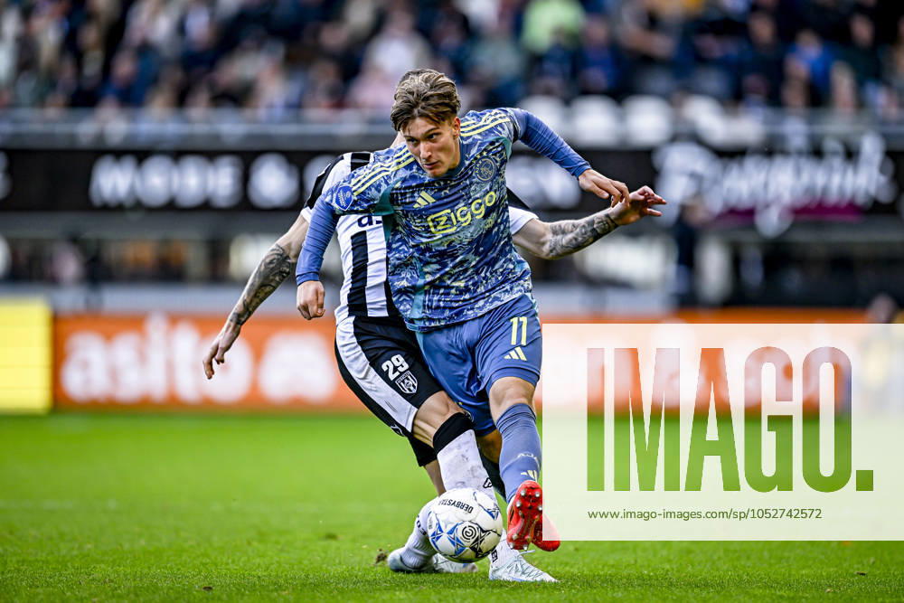 AFC Ajax Amsterdam forwarder Mika Godts, during the match Heracles Almelo - Ajax at the Asito stadium for the Dutch eredivisie season 2024-2025 in ALMELO, Netherlands on 20 oktober 2024, (photo by Stefan Koops EYE4images DeFodi Images) not used in POL SRB CRO FRA GBR NED ITA USA Defodi-746_196129