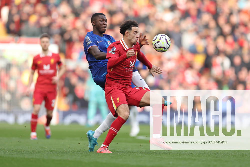 Football - 2024 2025 Premier League - Liverpool v Chelsea - Anfield - Sunday 20th October 2024 Curtis Jones of Liverpool and Moises Caicedo of Chelsea