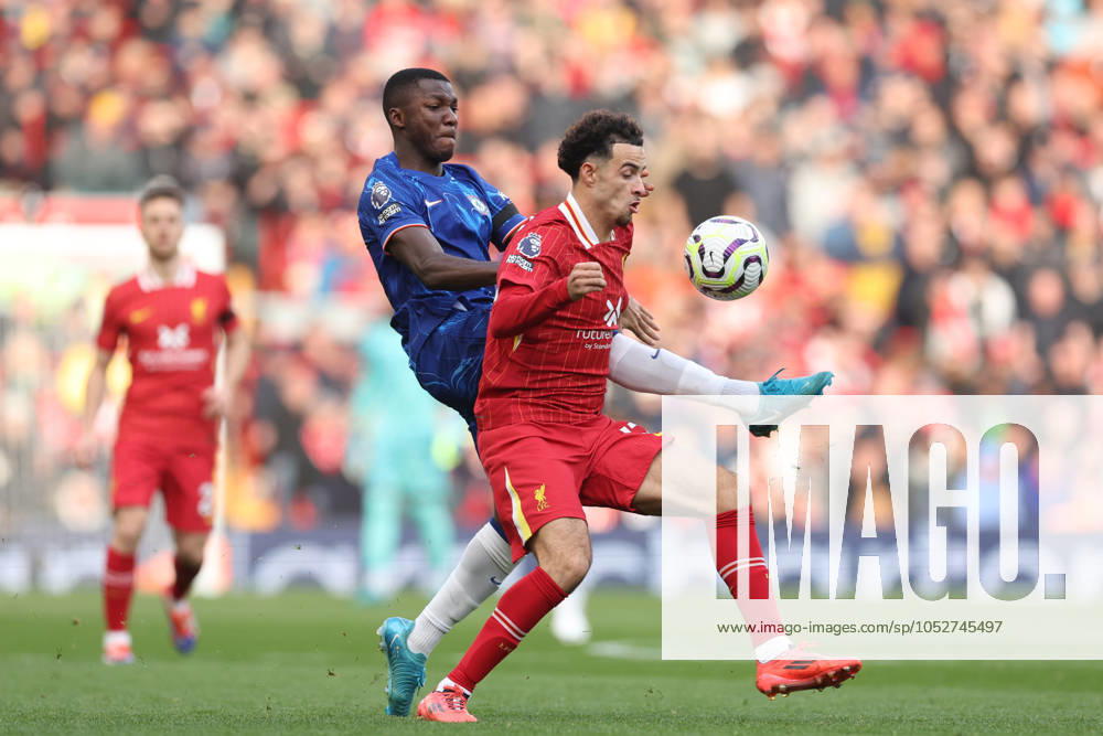 Football - 2024 2025 Premier League - Liverpool v Chelsea - Anfield - Sunday 20th October 2024 Curtis Jones of Liverpool and Moises Caicedo of Chelsea