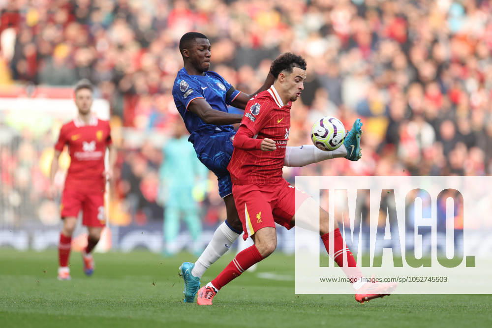 Football - 2024 2025 Premier League - Liverpool v Chelsea - Anfield - Sunday 20th October 2024 Curtis Jones of Liverpool and Moises Caicedo of Chelsea