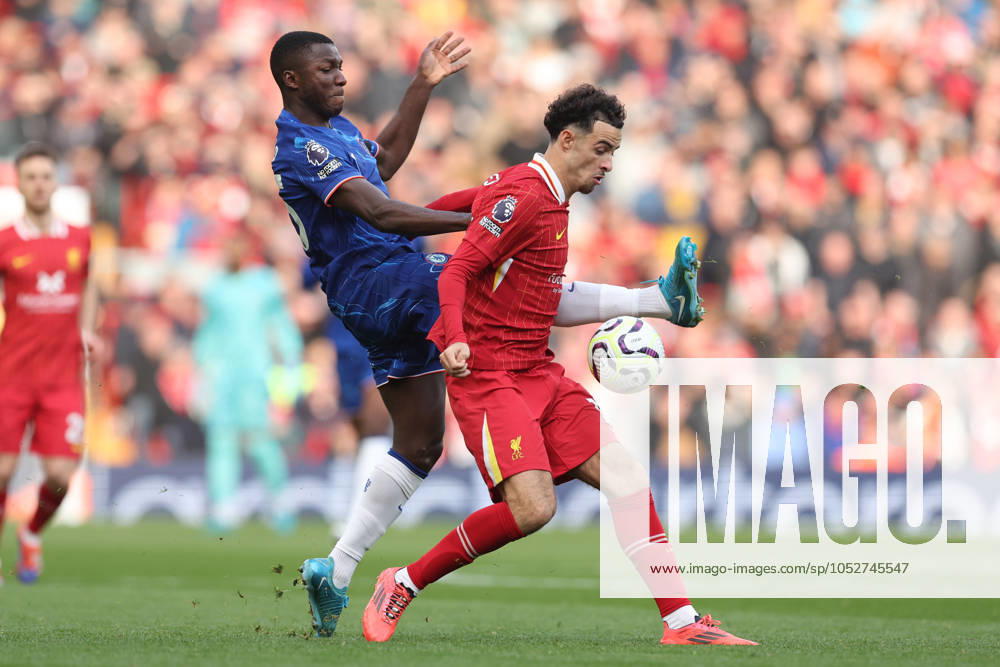 Football - 2024 2025 Premier League - Liverpool v Chelsea - Anfield - Sunday 20th October 2024 Curtis Jones of Liverpool and Moises Caicedo of Chelsea