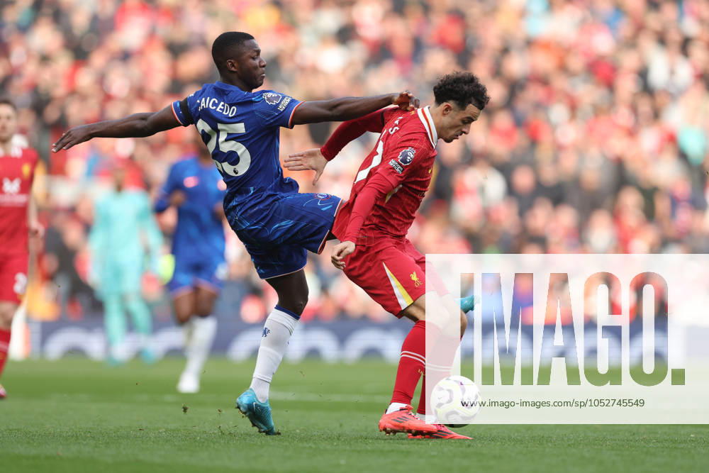 Football - 2024 2025 Premier League - Liverpool v Chelsea - Anfield - Sunday 20th October 2024 Curtis Jones of Liverpool and Moises Caicedo of Chelsea