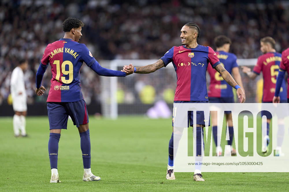 Lamine Yamal of FC Barcelona, Barca celebrates with Raphinha of FC Barcelona after scoring his team s third goal during the LaLiga EA Sports match between Real Madrid CF and FC Barcelona at Estadio Santiago Bernabeu on October 26, 2024 in Madrid, Spain. (Photo by: LGM Panoramic) FOOTBALL : Real Madrid CF vs FC Barcelona- LaLiga EA Sports - 26 10 2024 LGM Panoramic