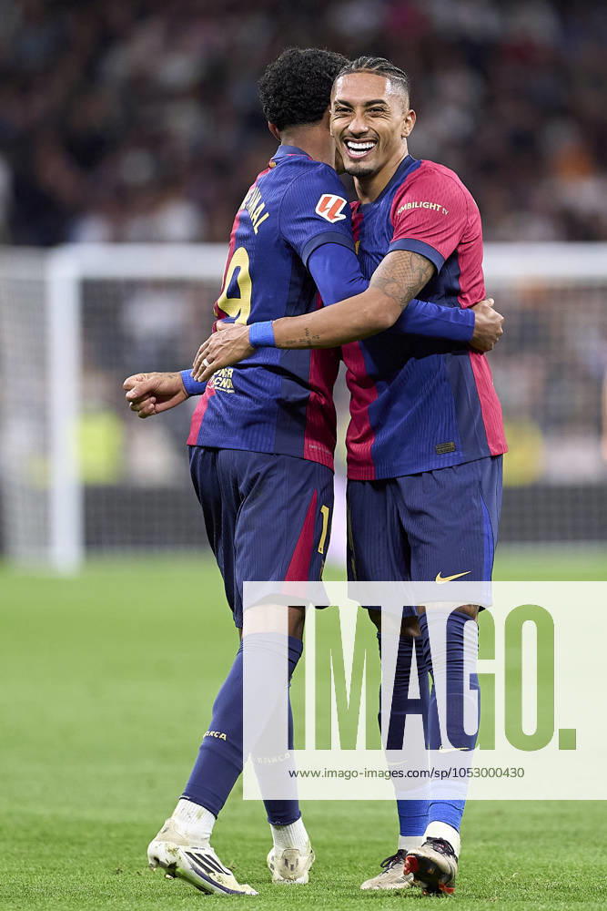 Lamine Yamal of FC Barcelona, Barca celebrates with Raphinha of FC Barcelona after scoring his team s third goal during the LaLiga EA Sports match between Real Madrid CF and FC Barcelona at Estadio Santiago Bernabeu on October 26, 2024 in Madrid, Spain. (Photo by: LGM Panoramic) FOOTBALL : Real Madrid CF vs FC Barcelona- LaLiga EA Sports - 26 10 2024 LGM Panoramic