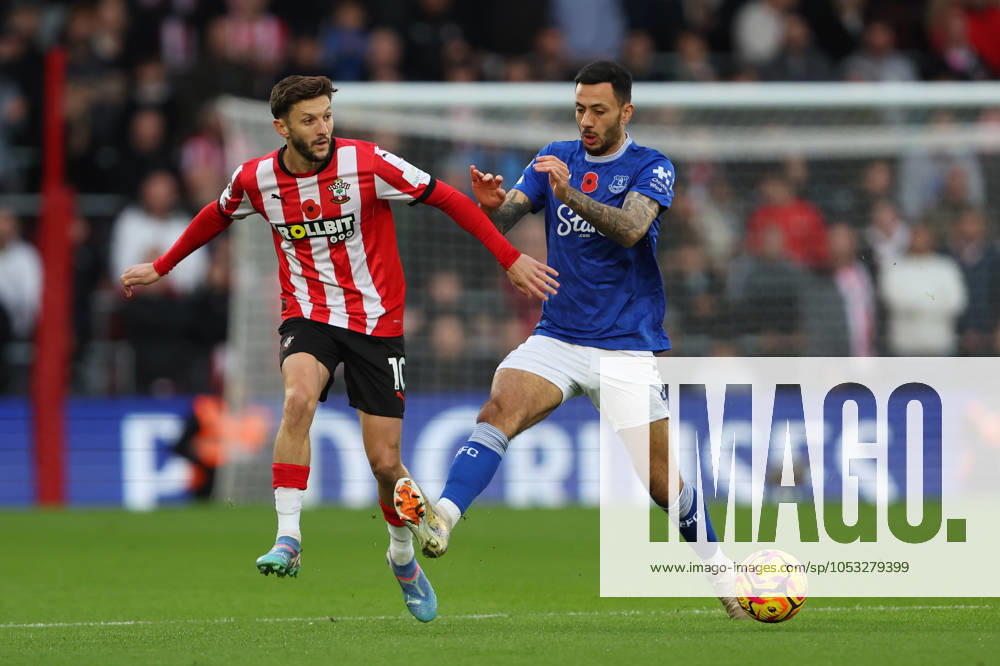 Football - 2024 2025 Premier League - Southampton vs Everton - St Marys Stadium - Saturday 2nd November 2024 Adam Lallana of Southampton and Dwight McNeil of Everton in action during the Premier League match at St Marys Stadium COLORSPORT Shaun Boggust