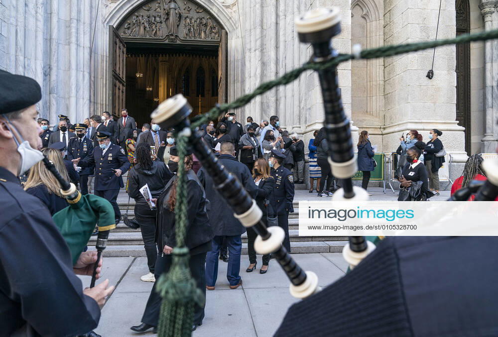 NYPD holds mass for members died of COVID-19 Family members and police officers leave cathedral after NYPD holds mass honoring members died of COVID-19 at St. Patrick s Cathedral. 46 members of NYPD Died during pandemic so far and many of them did not receive proper funeral due to pandemic restrictions. Almost 20% of NYPD members were sick with coronavirus during pick of pandemic in the city. Cardinal Timothy Dolan lead the mass. Mayor Bill de Blasio and Police commissioner Dermot Shea speak. New York New York United States