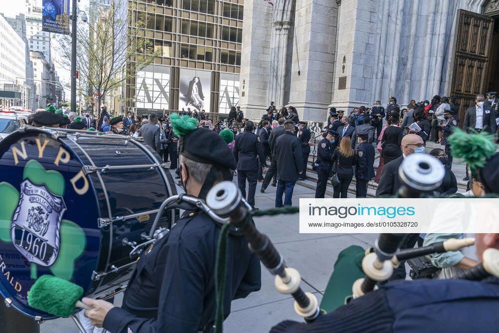 NYPD holds mass for members died of COVID-19 Family members and police officers leave cathedral after NYPD holds mass honoring members died of COVID-19 at St. Patrick s Cathedral. 46 members of NYPD Died during pandemic so far and many of them did not receive proper funeral due to pandemic restrictions. Almost 20% of NYPD members were sick with coronavirus during pick of pandemic in the city. Cardinal Timothy Dolan lead the mass. Mayor Bill de Blasio and Police commissioner Dermot Shea speak. New York New York United States